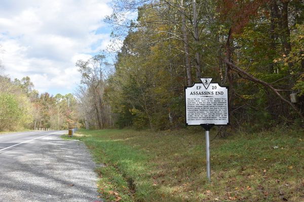 The historical marker on the side of the highway. 
