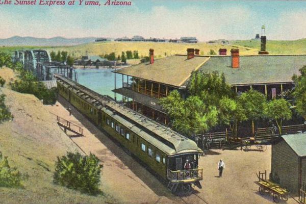 Early 20th-century postcard of the "Sunset Express" train passing through Yuma, Arizona. 