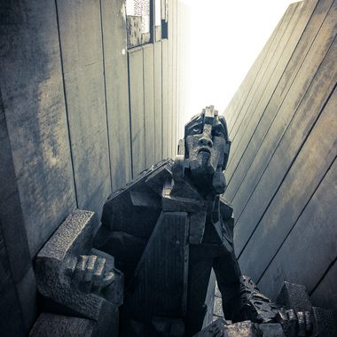 A communist overlord menaces the city below.
