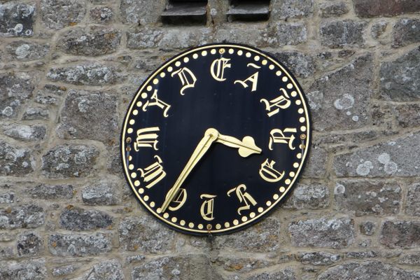 The clock face.
