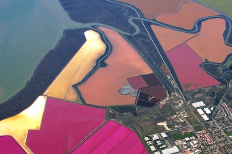 The brightly colored salt ponds seen from above.