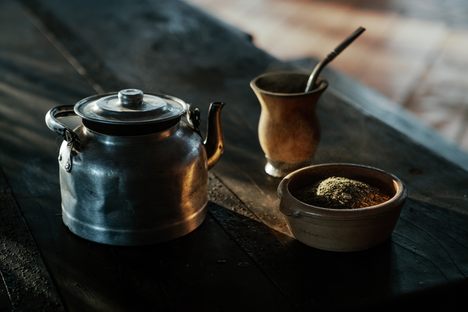 Yerba mate is typically sipped through a bombilla, a type of metal drinking straw, and is passed around the circle.