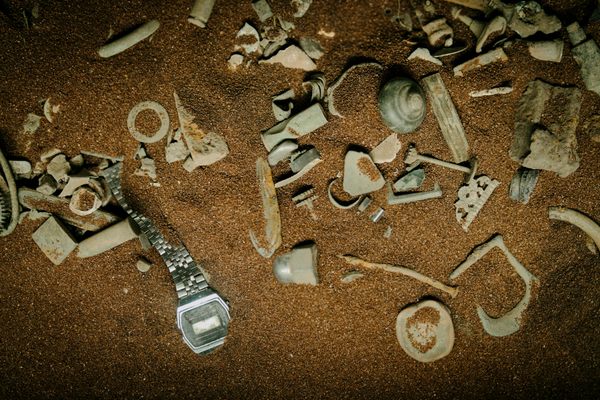 A display case at Denmark's Nationalmuseet shows the detritus and  historical artifacts a metal detectorist might uncover. Every year, thousands of valuable items are discovered. 