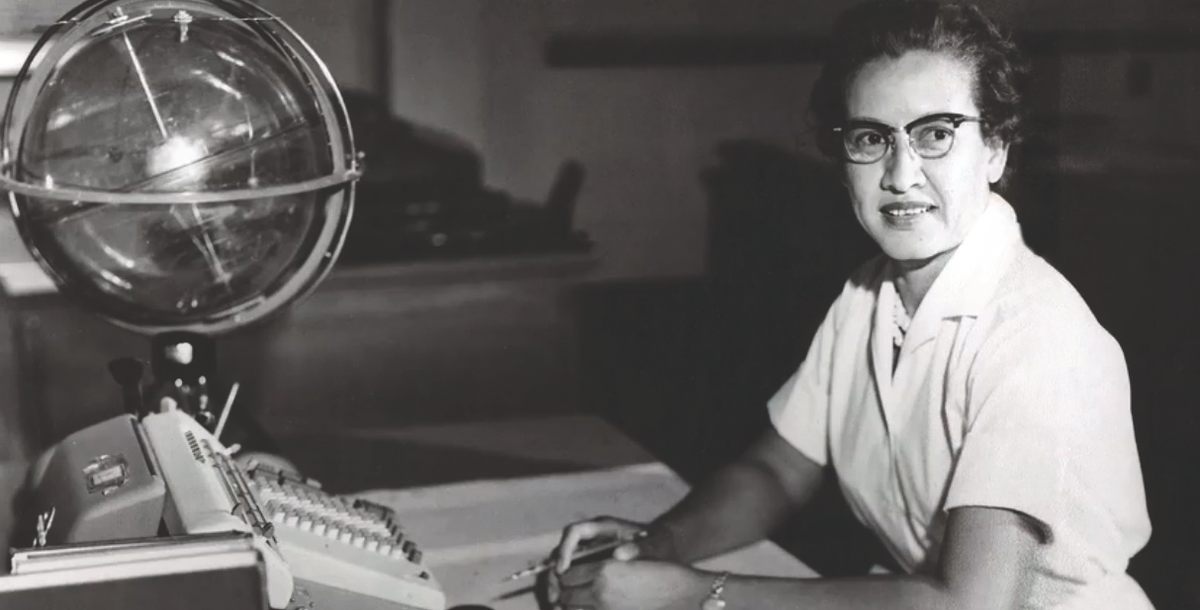 NASA research mathematician Katherine Johnson at her desk at NASA Langley Research Center with a globe, or "Celestial Training Device," 1962.