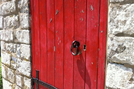 It's a simple place; the only notable feature on the outside ground floor is the door.