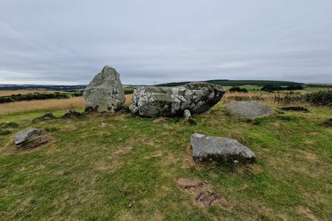 The recumbent stone with a fallen flanking stone.