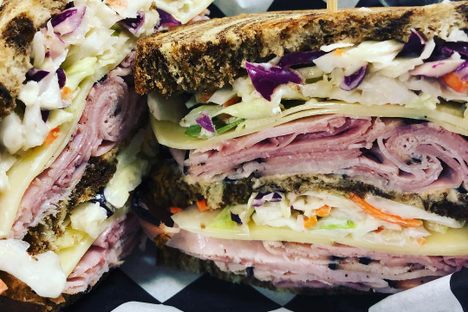Triple decker rye, with boarshead ham, Swiss, coleslaw and Russian dressing. 