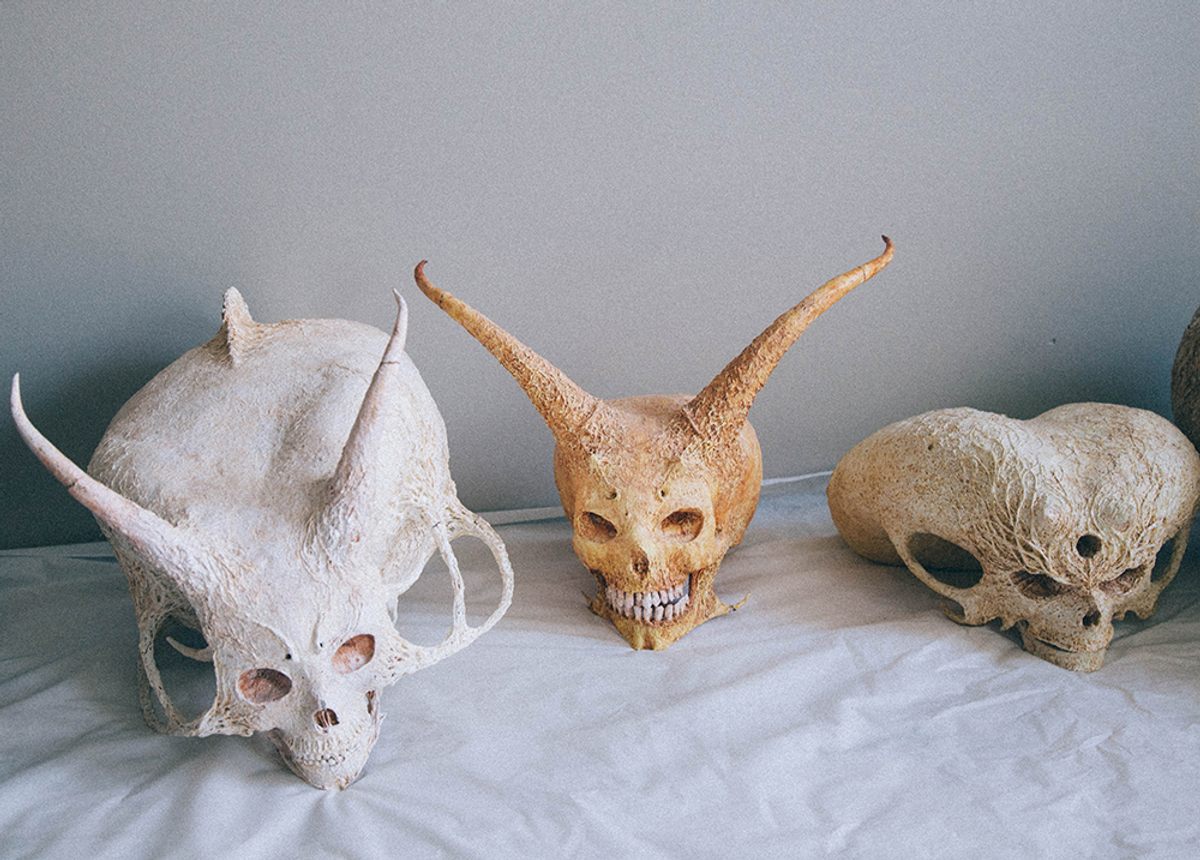 Three of Yamada's space alien skulls.