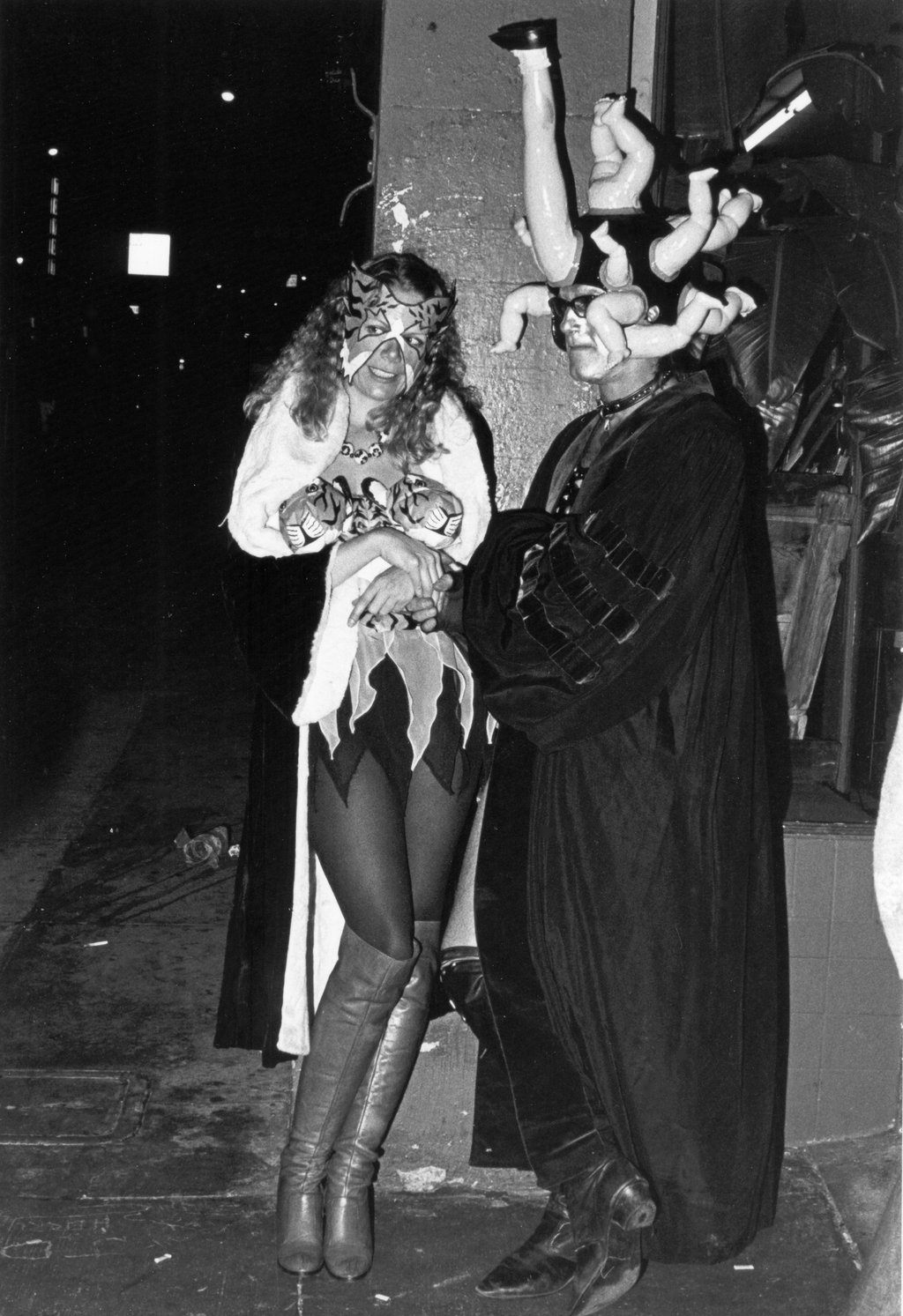 Two partiers in extravagant costume on Polk Street for Halloween 1980.
