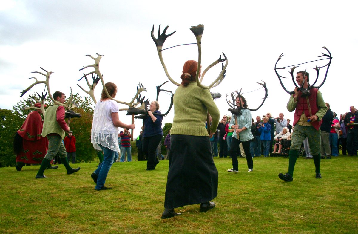 Shepherd (second from right) was inspired to document festivals after participating in the Abbots Bromley Horn Dance.