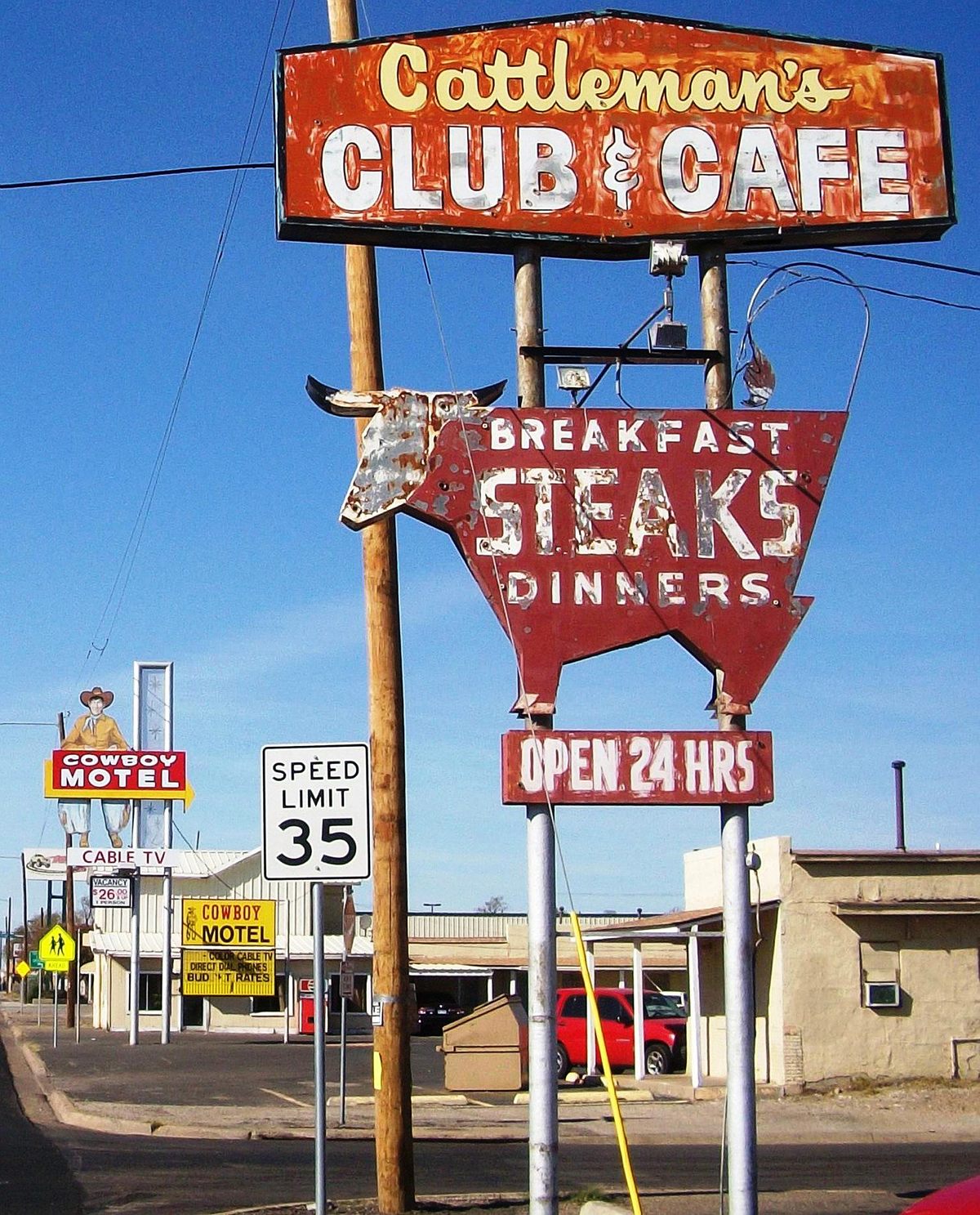 Vintage signs for the Cattleman's Club & Cafe in Amarillo, Texas. Cattleman's has been in business since 1961.