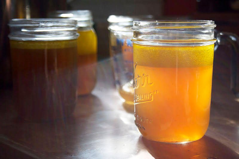 Perrotte’s perpetual broth, shown in her kitchen circa 2012.