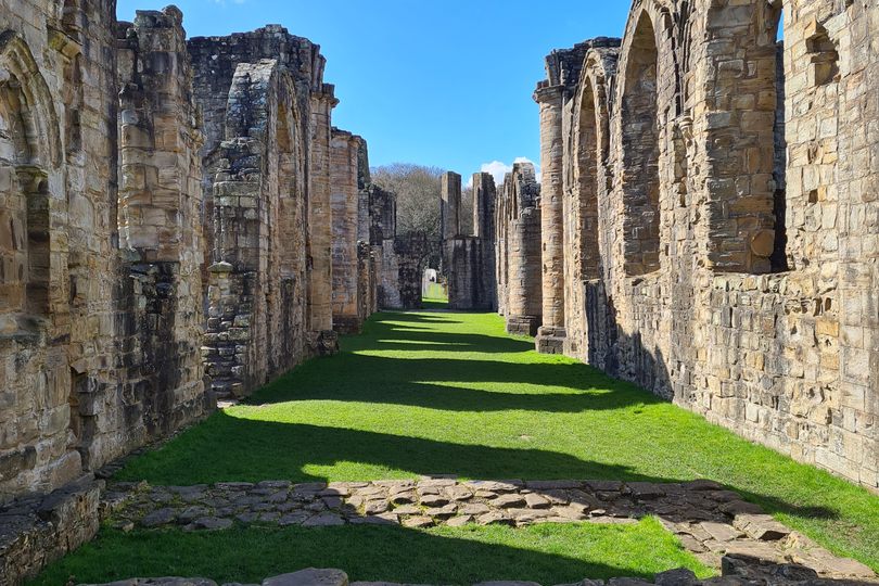 Looking through the remains of the Priory church