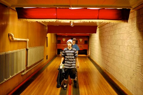 Original wooden bowling lanes and pin boys