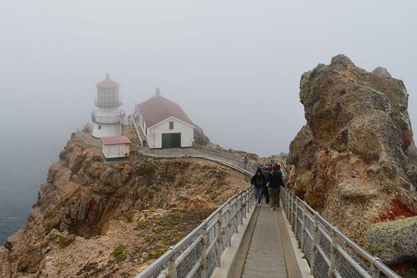 A thick fog engulfs the Point Reyes Lighthouse.