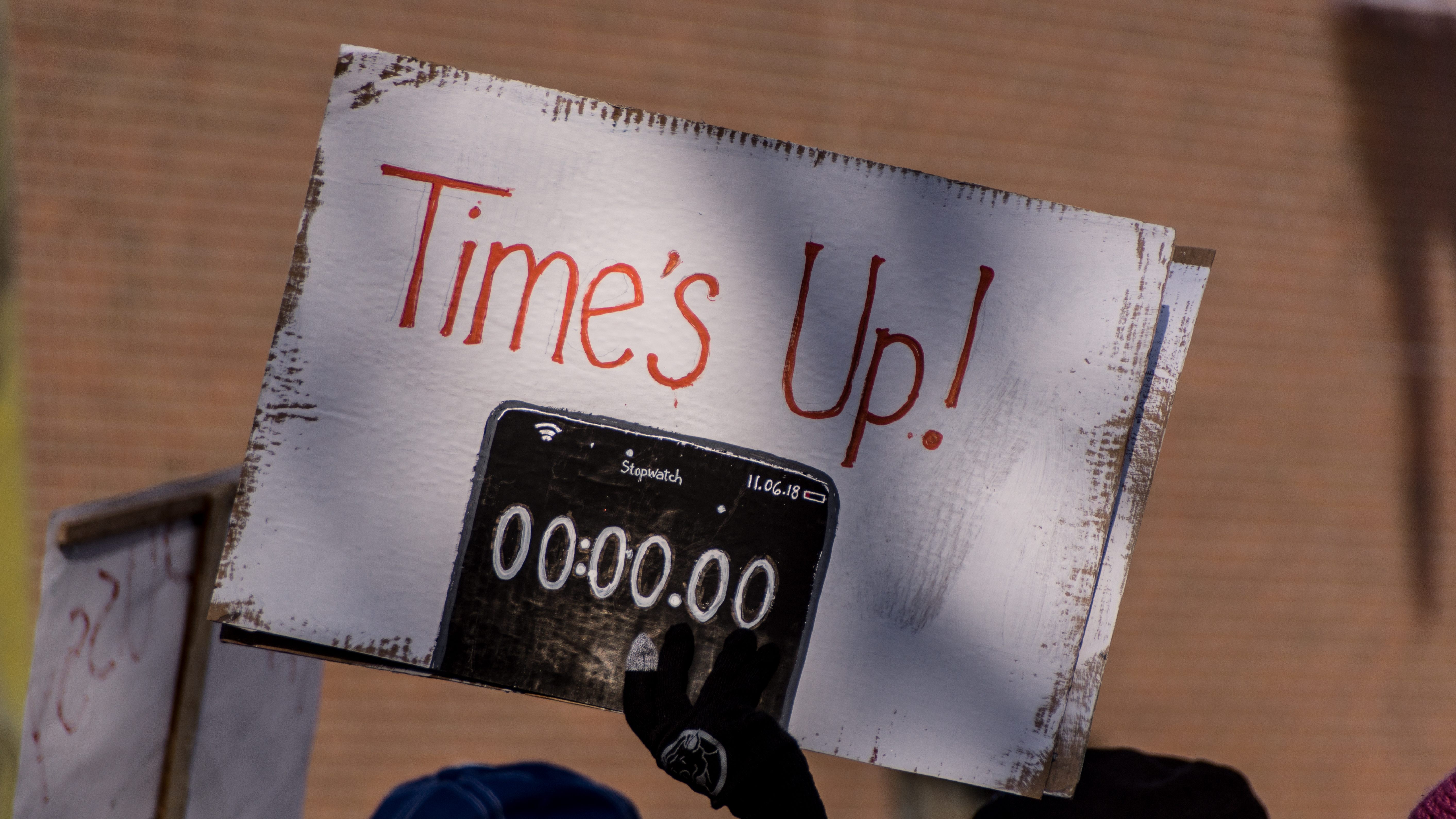 A protest sign from the 2018 New Hampshire Women's march. An offshoot of the #MeToo movement, the Time's Up Legal Defense Fund provides funds to fight workplace sexual harassment, including of restaurant workers.
