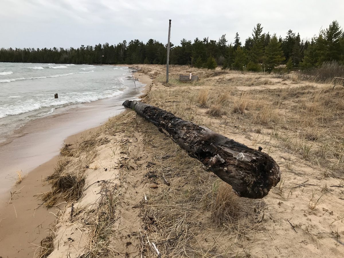 Shoreline wreckage isn't always what people think or hope it is. Lusardi says he's never seen a mast wash ashore. This, photographed on the shore of Lake Huron in Alpena, Michigan, is probably from the dock of a historic bathing pavilion dating to the 1890s.