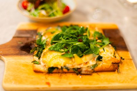 Unlike pizza, this flatbread is seldom topped with cheese or tomato.