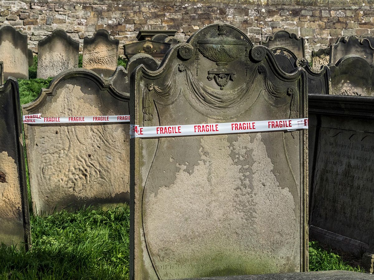 In Whitby, England, bones from the cemetery at St. Mary's Church—the inspiration for a scene in Bram Stoker’s <em>Dracula</em>—tumbled from a cliff in 2013, after heavy rains contributed to a landslide.