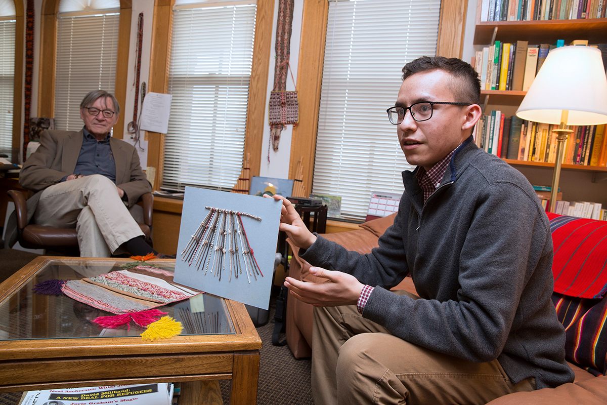 Manny Medrano (right), with guidance from Professor Gary Urton, has decoded the meaning behind khipus, an Inca bookkeeping method of knotted rope.