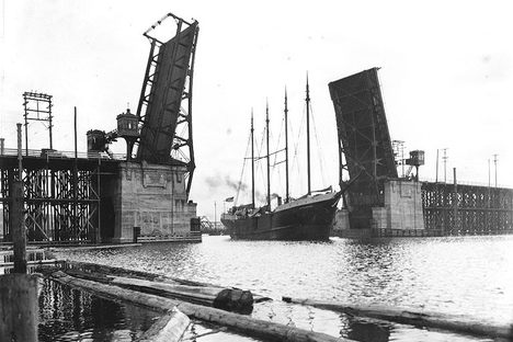 Ballard Bridge with open drawbridge to allow passage of a ship, March 13, 1918