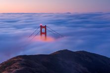 The Golden Gate Bridge as seen from the Marin Headlands at sunrise.