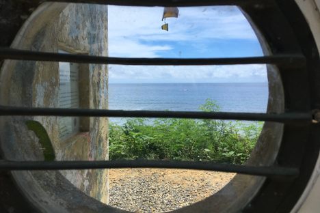 You can look through the porthole window out to the sea