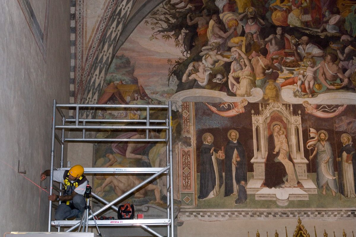Building the scaffolding to install Nelli’s "Last Supper."