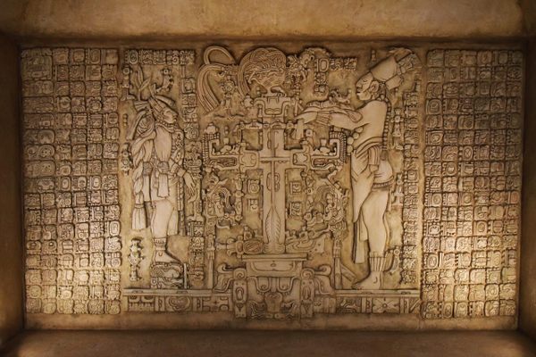 Replica of the Planque relief depicting a smoking deity.