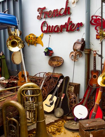 Musical instruments in the courtyard of SecondLine Arts and Antiques in New Orleans' French Quarter. 