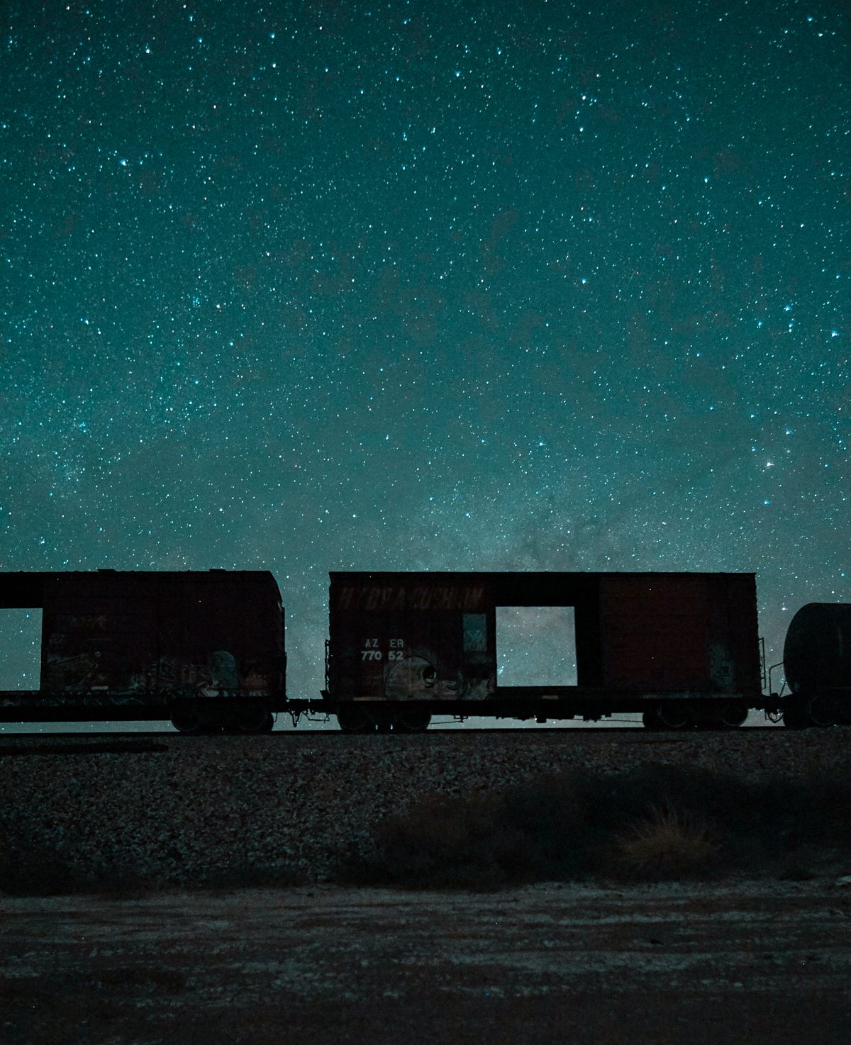 Aditya Khuller's photograph of a cargo train that had "windows" to the stars beyond, near the Salt Flats in Carlsbad, New Mexico.