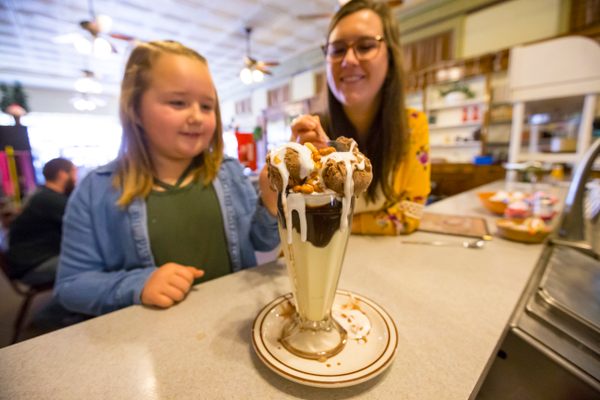 Ice cream fans have been enjoying the Tin Roof Sundae since 1930.