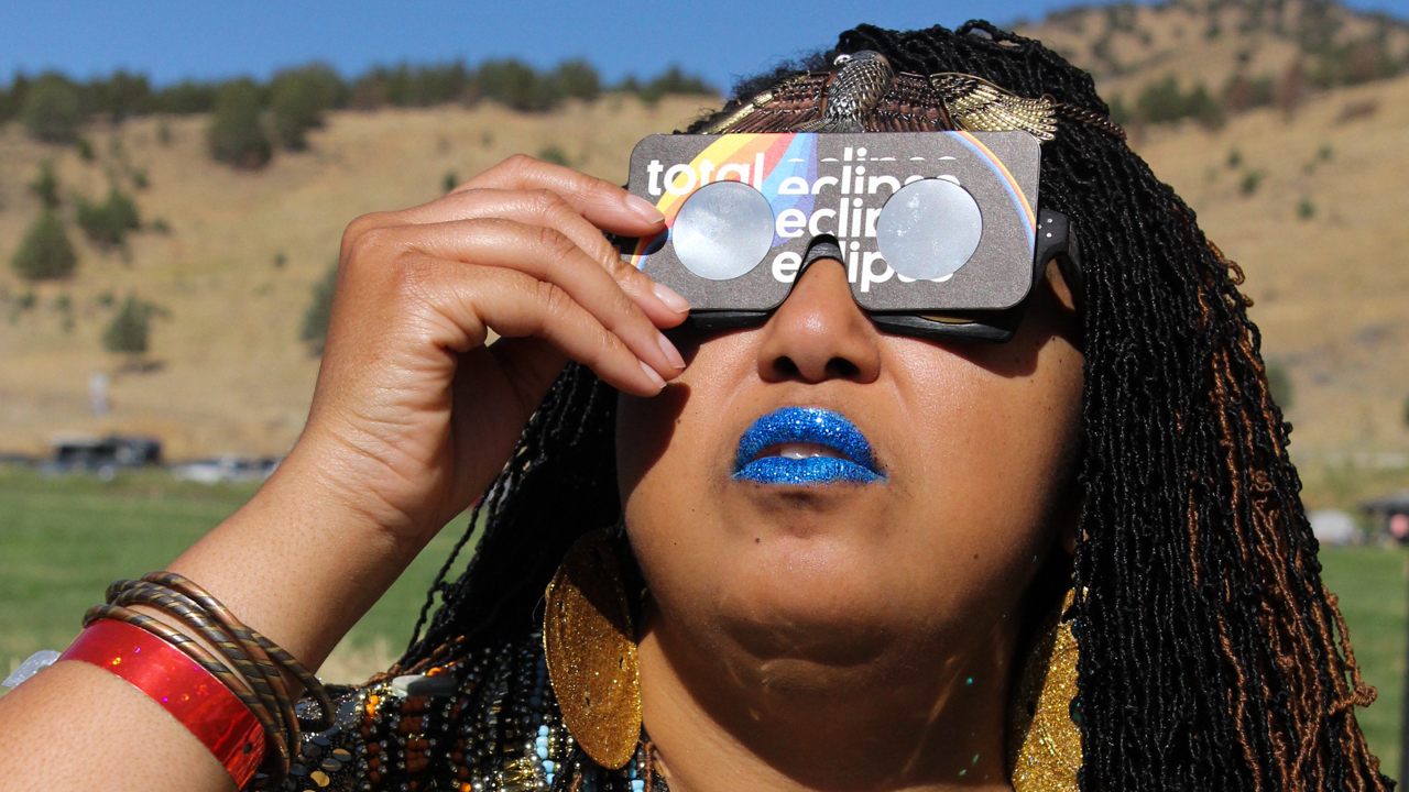Tara Middleton, of Sun Ra Arkestra, looked radiant in custom eclipse viewing glasses. 