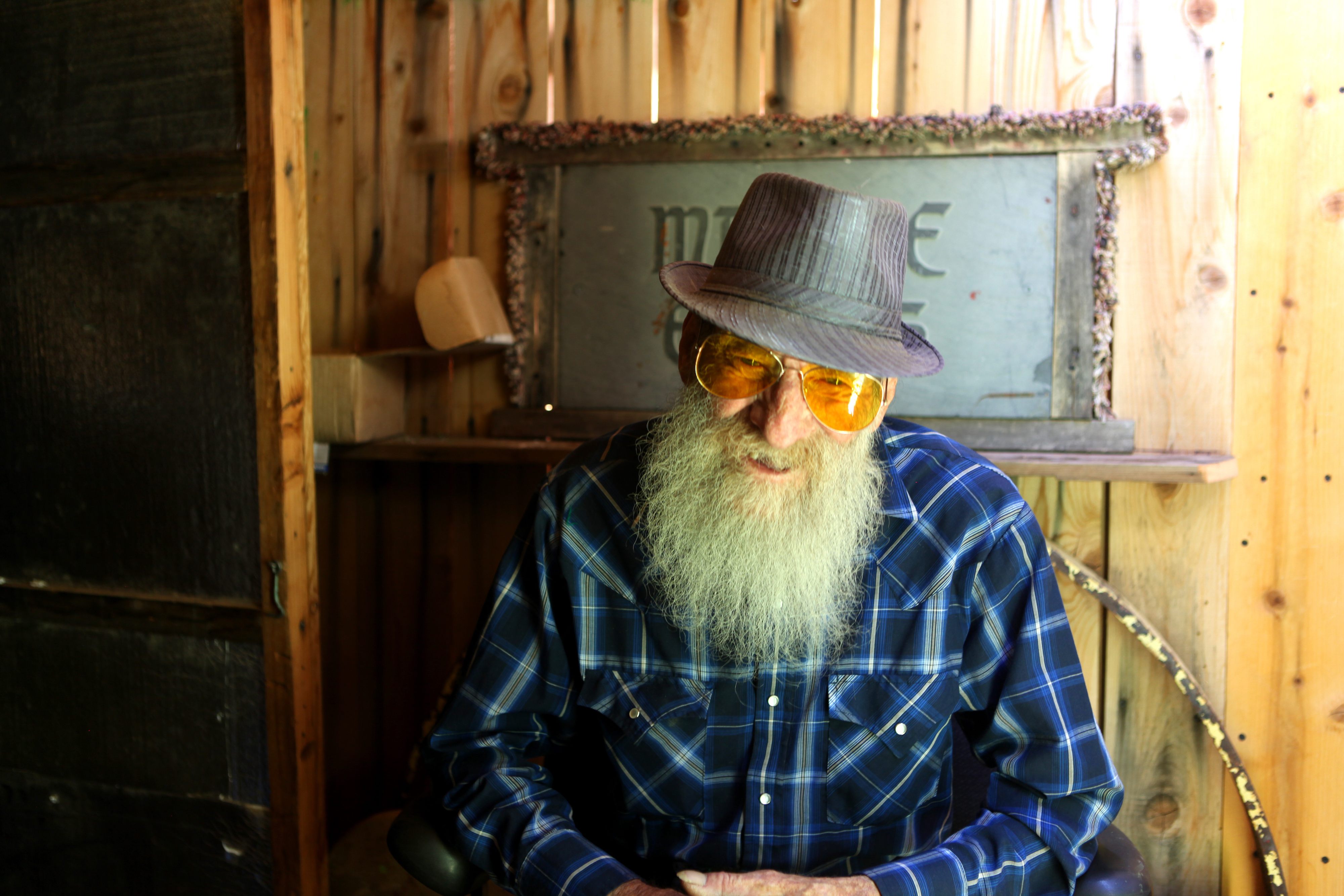 Bob holding court outside the cave. 