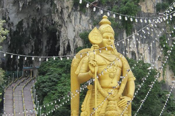 The 272 steps to the main cave, guarded by Murugan