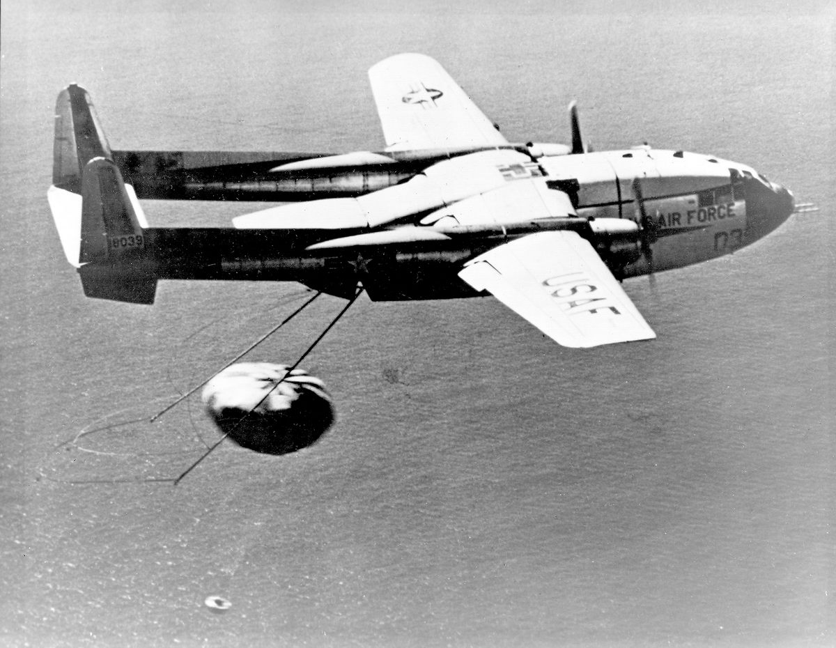 The CIA created America's first satellite program in the 1950s. Film capsules from CORONA reconnaissance satellites (bottom left) were often retrieved by the Air Force during their re-entry from space.