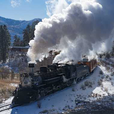 The Durango-Silverton Train billows with steam along its 26-mile winter trek to Cascade Canyon.