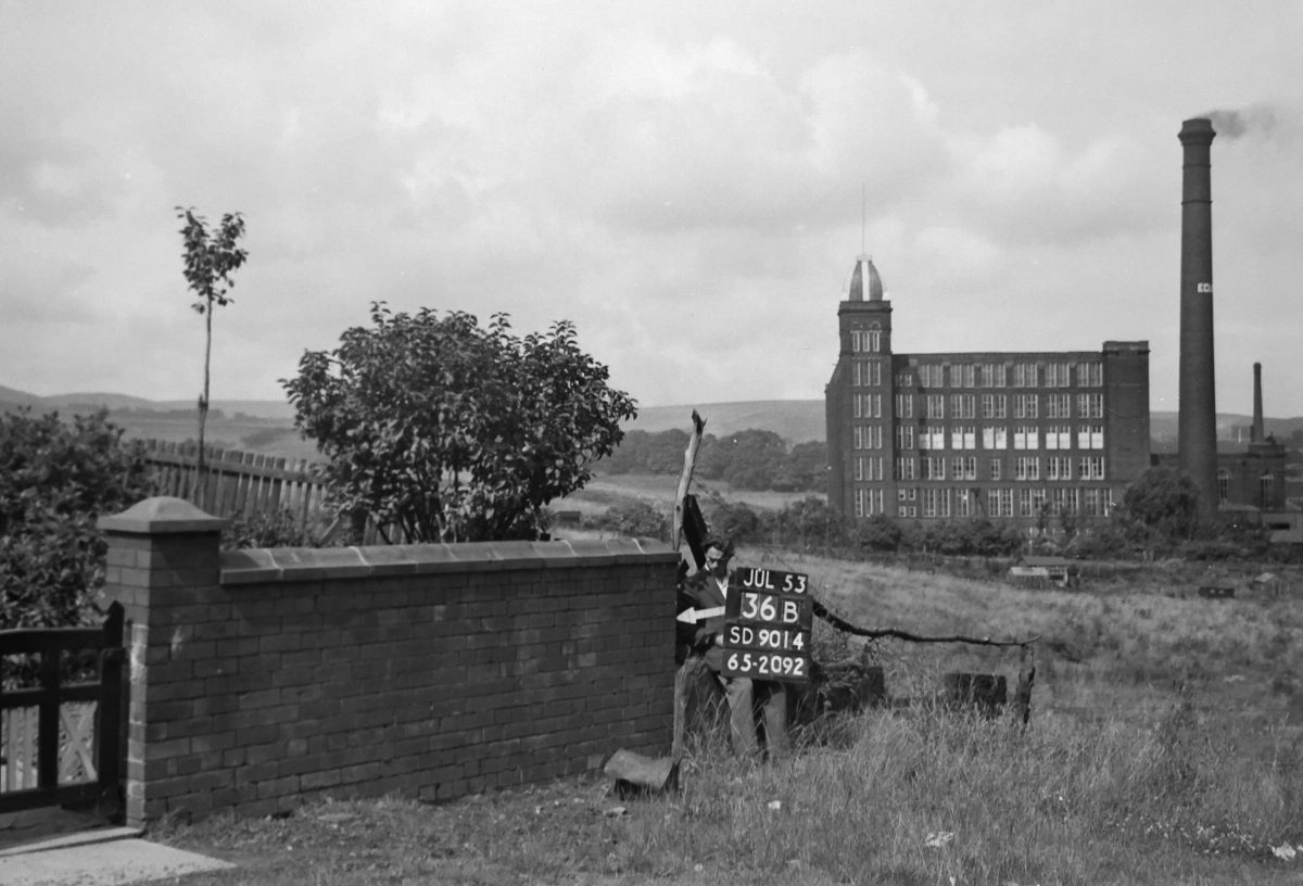 A survey worker finds a revision point on the outskirts of Rochdale.