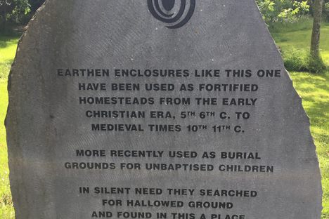 Descriptive plaque at the site entrance.