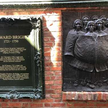 The Bronze Relief illustrating the famous wager.