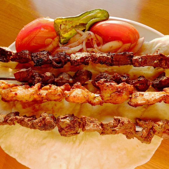 Kurdish cuisine shares some dishes, like meat kebabs, with other Middle Eastern cuisines.