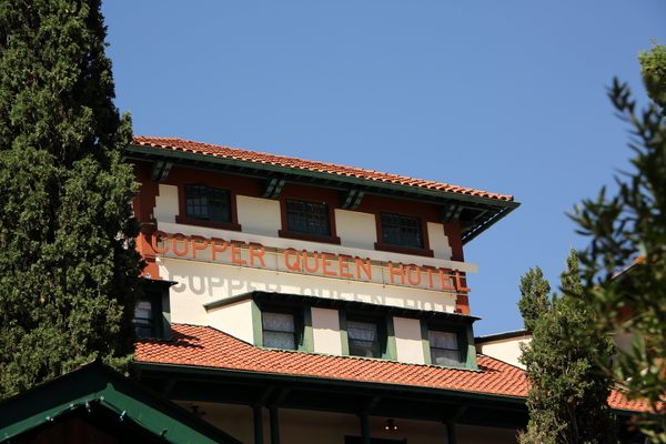 The sign welcoming visitors to the Copper Queen Hotel.