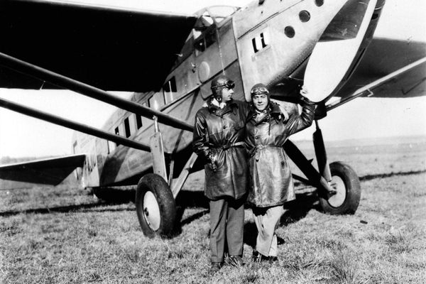 Antoine de Saint-Exupéry (left), Aéropostale pilot and author of The Little Prince, stands in front of a plane in 1929.