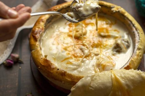 Fakharet Malakehis a stuffed bread brimming with gooey bechamel and cheese.