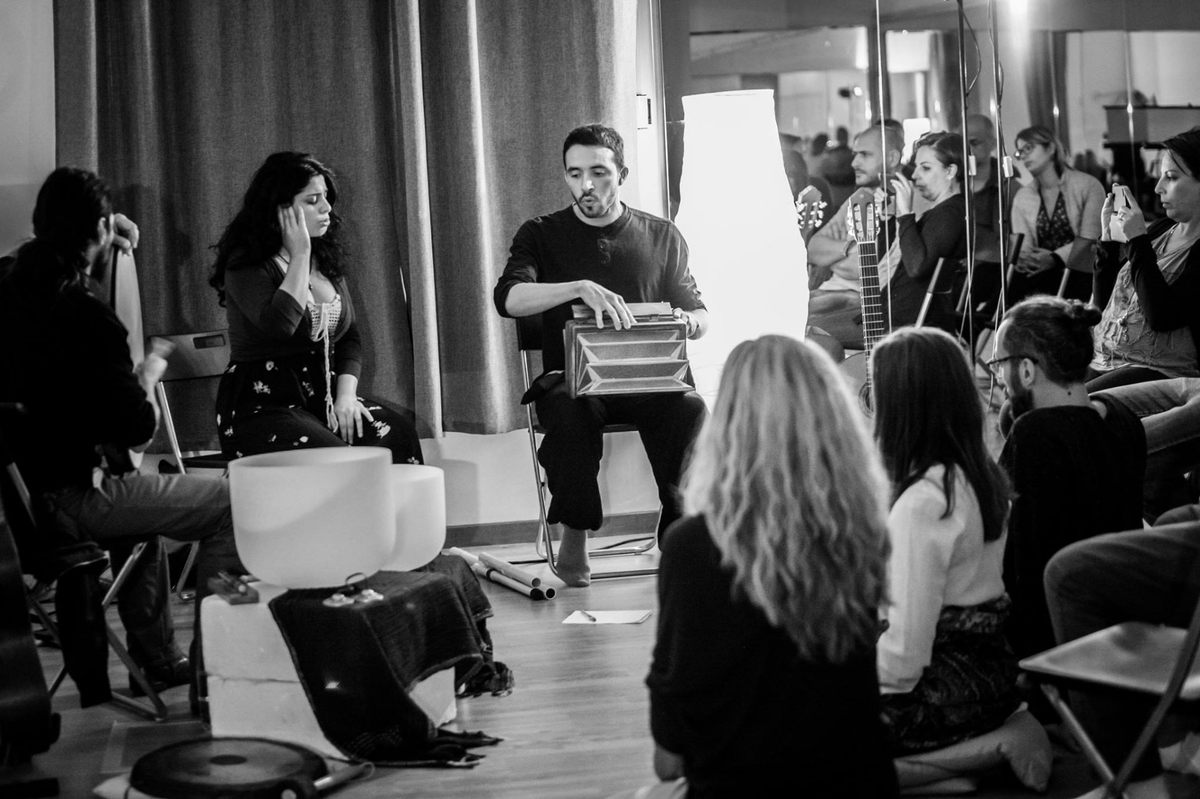 Giovanni Bortoluzzi (center) and Ilaria Orefice (left) perform throat singing—and stretching the form with instruments.