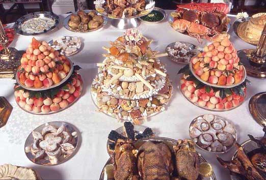 Desserts and fruit pyramids were the centerpiece of this meal.