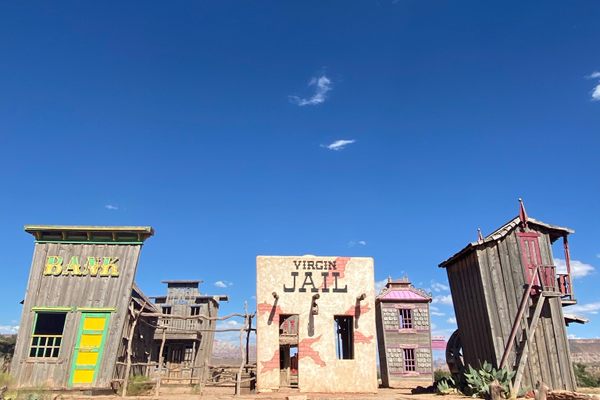 A series of storefronts resembling an Old Western town. 