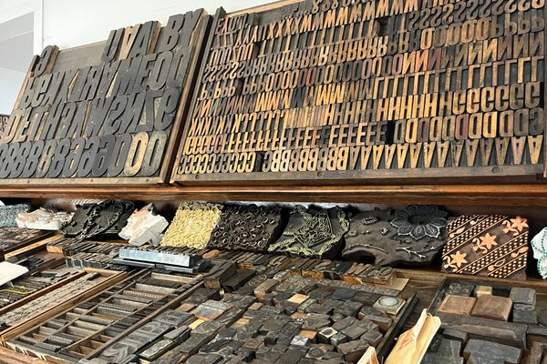 The museum includes tools like ink blocks and iron letterpresses, and even a foot-operated press called a Heidelberg Press that was used to print money.