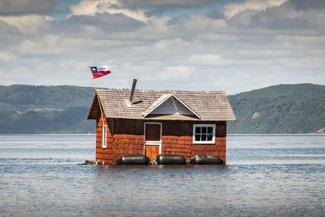Moving a house on Chiloe Island, known as a minga.