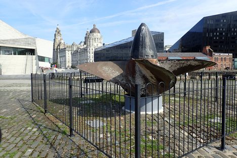 The Lusitania propeller with the “Three Graces” in the background.